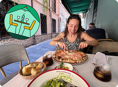 Image Description: A person smiling while cutting a pizza. A Restaurant Explorer badge is on the top left corner of the image. 