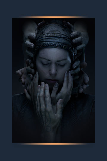 Key art for Senua's Saga: Hellblade II featuring Senua's solemn face being caressed by disembodied hands from all angles.