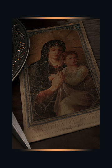 Key art for Mafia: The Old Country featuring an aged picture labeled Madonna della Grazie.