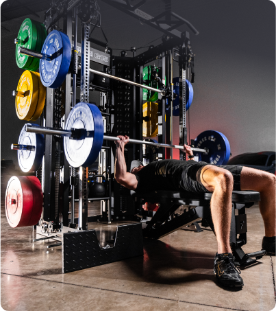 Man doing bench press on Force USA G15