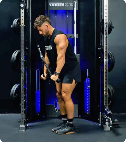 Man doing rope pull downs on Force USA C10 Man doing rope pull downs on Force USA C10