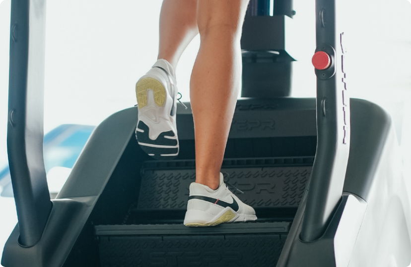 Close up low angle of female legs walking on STEPR steps Close up low angle of female legs walking on STEPR steps