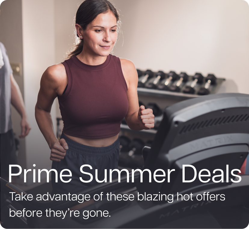 Woman running on Matrix treadmill in home gym