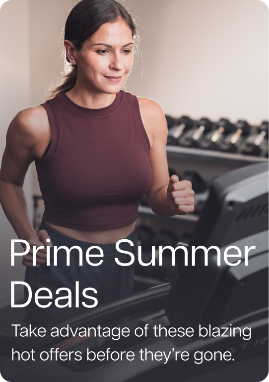 Woman running on Matrix treadmill in home gym