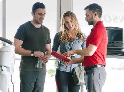 JFW talking with male and female customer about financing options