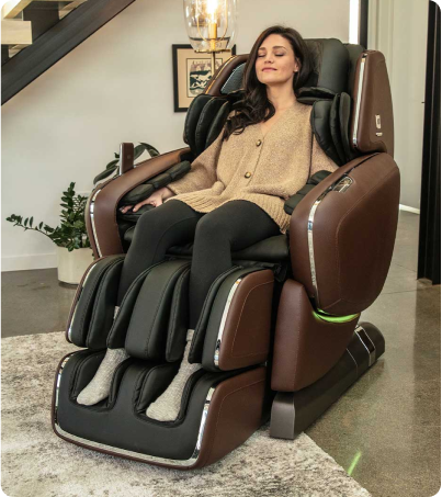 Woman relaxing in Walnut colored OHCO M.8 NEO massage chair Woman relaxing in Walnut colored OHCO M.8 NEO massage chair