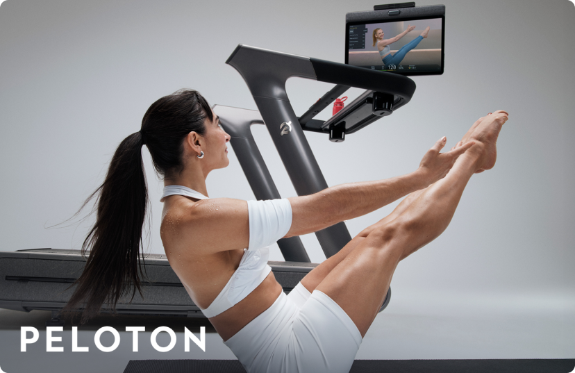 Woman doing cross training workout with Peloton Treadmill+ Woman doing cross training workout with Peloton Treadmill+