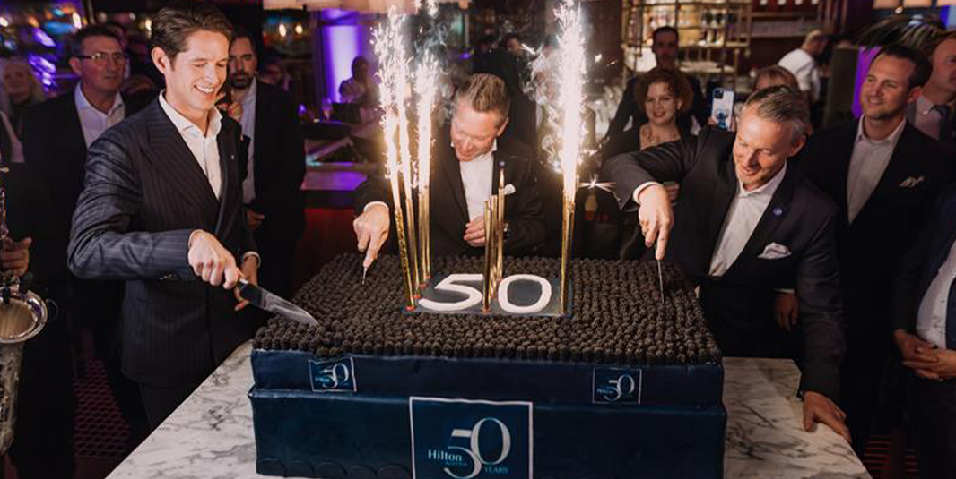 People celebrating Hilton Vienna Park 50 year celebration