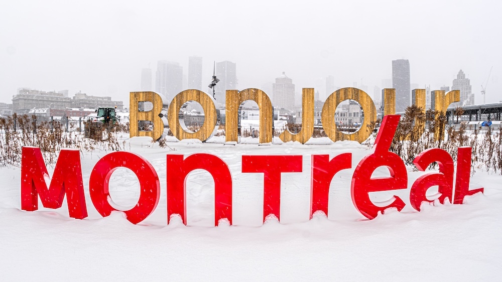 A man speaks at a lectern