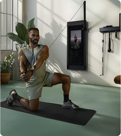 Man using remote control of Synca JP1100 Massage Chair in home Man using remote control of Synca JP1100 Massage Chair in home