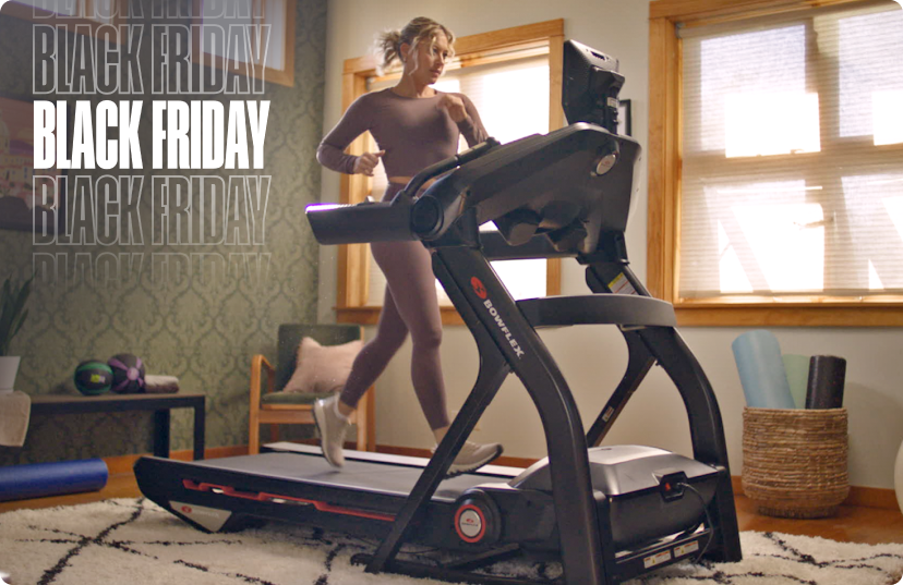 Woman running on BowFlex Treadmill 10 at home