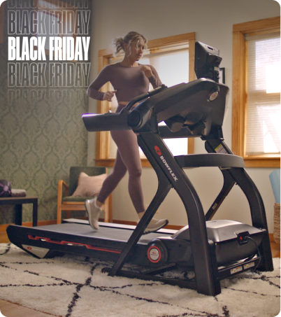 Woman running on BowFlex Treadmill 10 at home Woman running on BowFlex Treadmill 10 at home