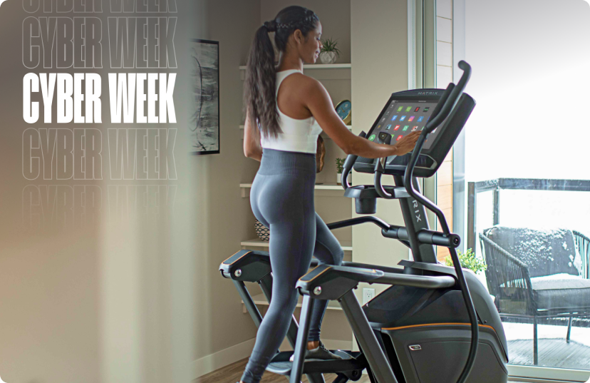 Woman using Matrix Ascent Trainer in home office