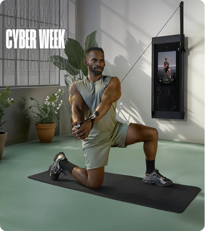 Man working out with Tonal 2 Smart Gym in industrial loft