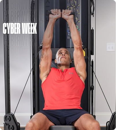 Man in red tank top working out on Matrix FTR30 functional trainer Man in red tank top working out on Matrix FTR30 functional trainer