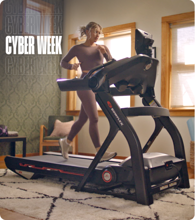 Woman running on BowFlex Treadmill 10 at home