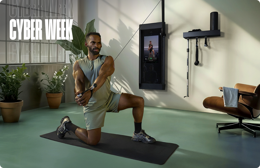 Man using Tonal 2 smart home gym in industrial loft