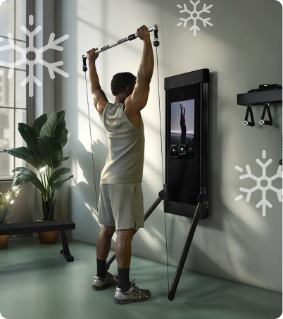 Man working out with Tonal 2 Smart Home Gym in industrial loft