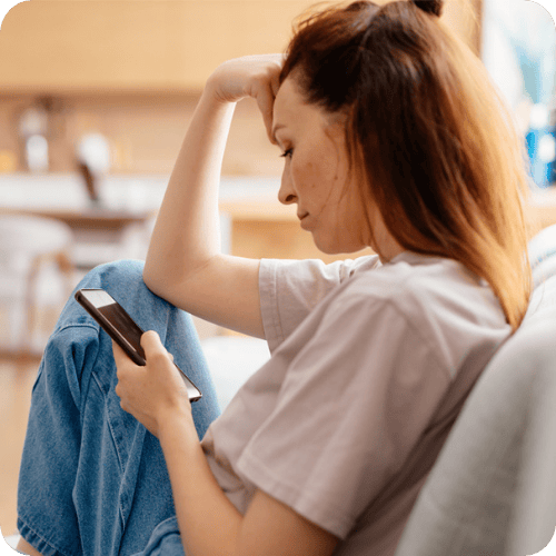 mom on couch searching questions parents googled in 2025