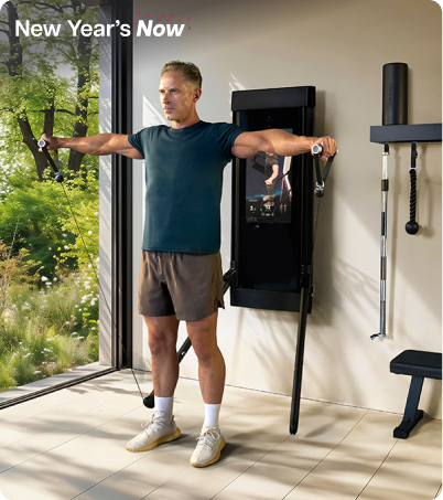 Man working out with Tonal 2 Smart Home Gym in modern loft