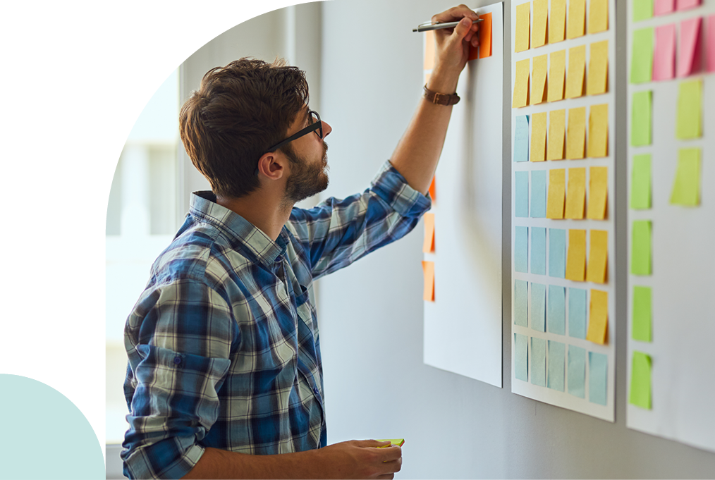 Man writing on a board