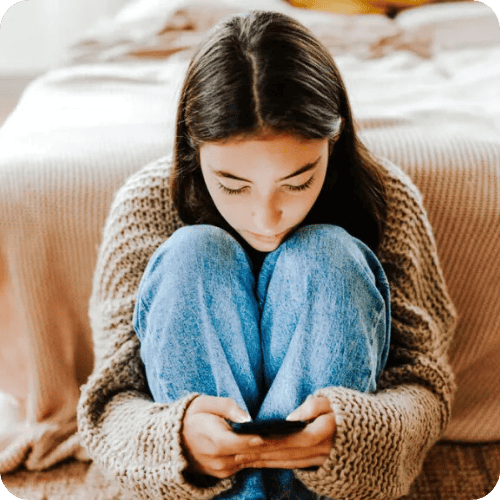 a teen girl on her smartphone