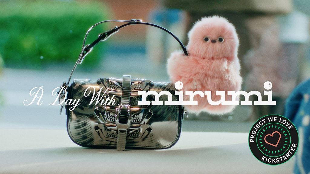 Mirumi: A Charm Robot that Steals a Glance—and Your Heart