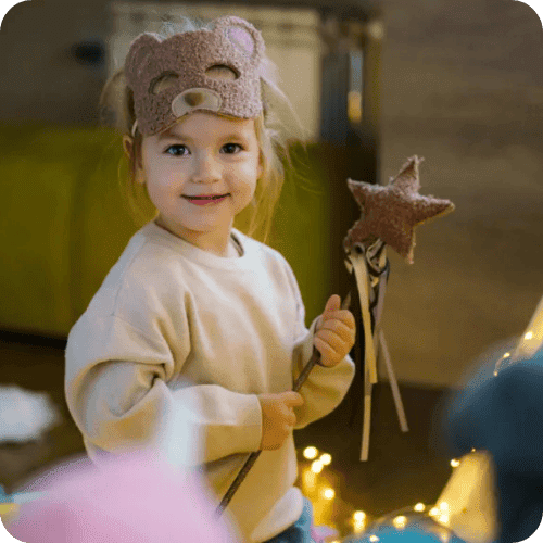 a little girl in a bear costume and wand on how to compliment a girl