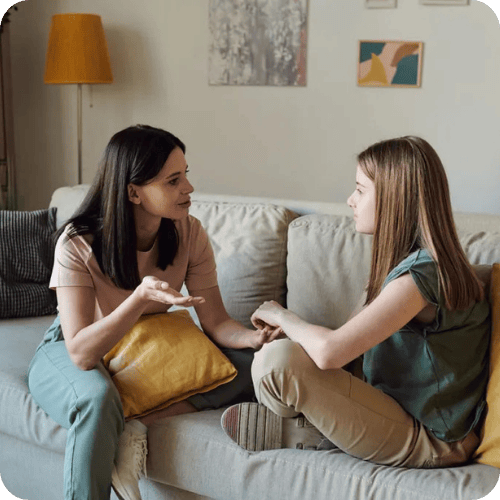a mother and daughter talking