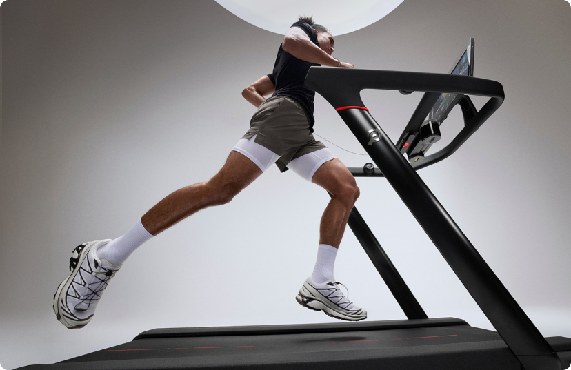 Male athlete running on Peloton Tread
