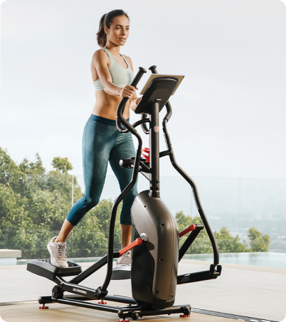 Female training on Schwinn 411 Elliptical