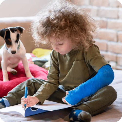 a little kid with a broken arm in a blue cast