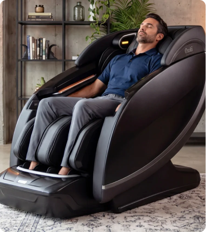 Man relaxing in Platinum Sapphire 4D+ massage chair at home