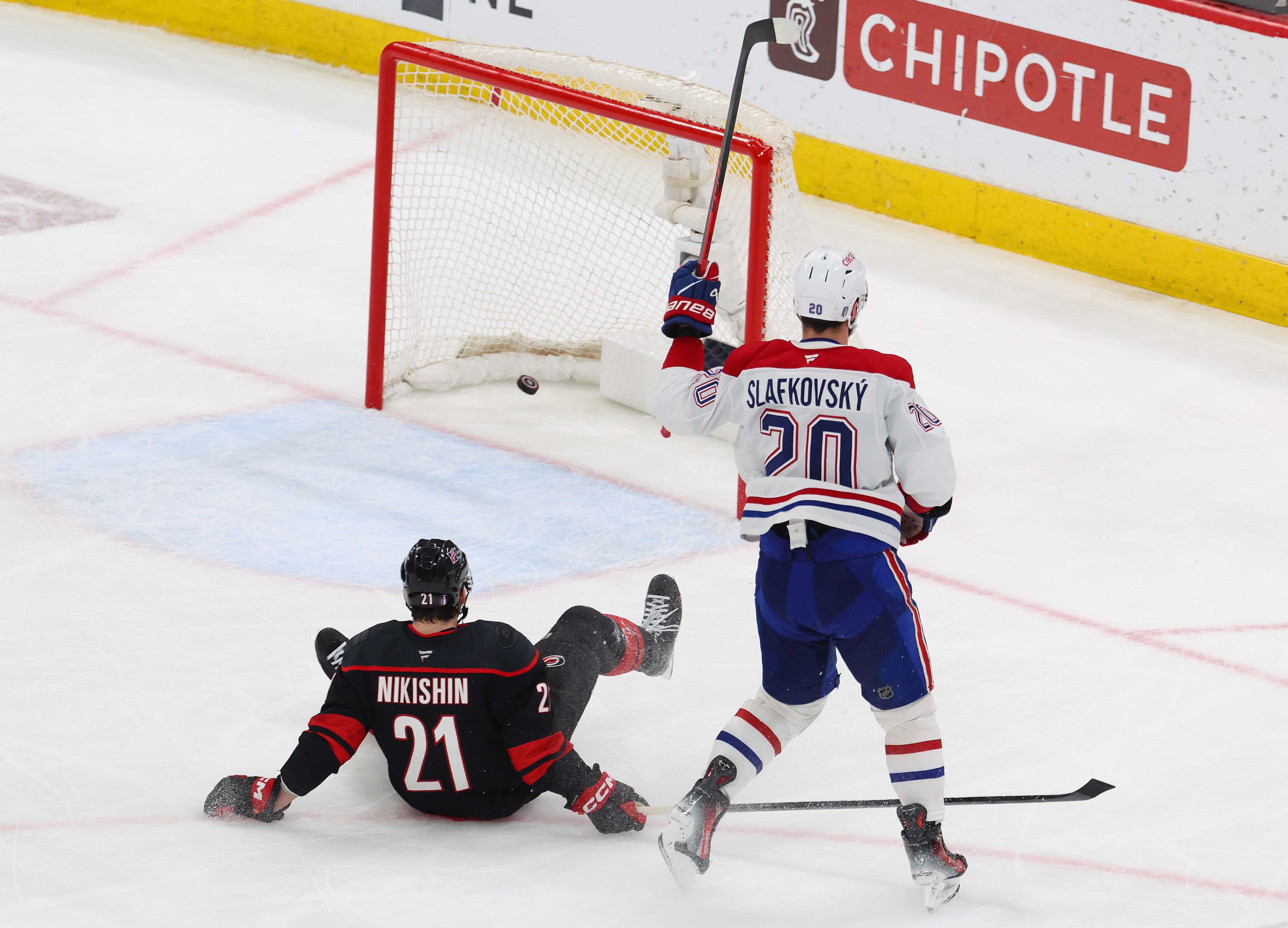 Juraj Slafkovsky #20 of the Montreal Canadiens celebrates after scoring an empty net goal against the Carolina Hurricanes during the third period in Game One of the Eastern Conference Final of the 2026 Stanley Cup Playoffs at Lenovo Center on May 21, 2026 in Raleigh, North Carolina.