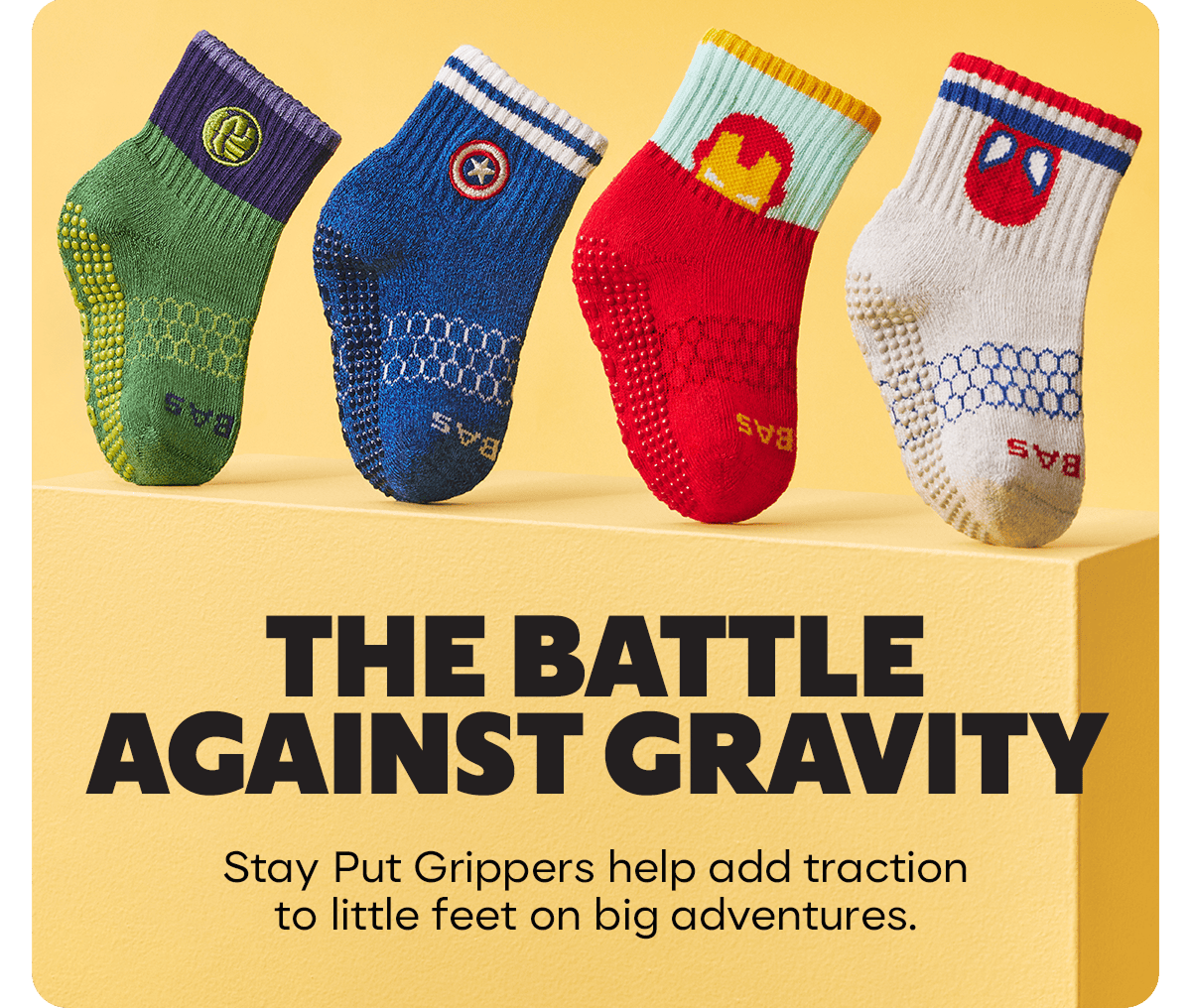 THE BATTLE AGAINST GRAVITY. Stay Put Grippers help add traction to little feet on big adventures.