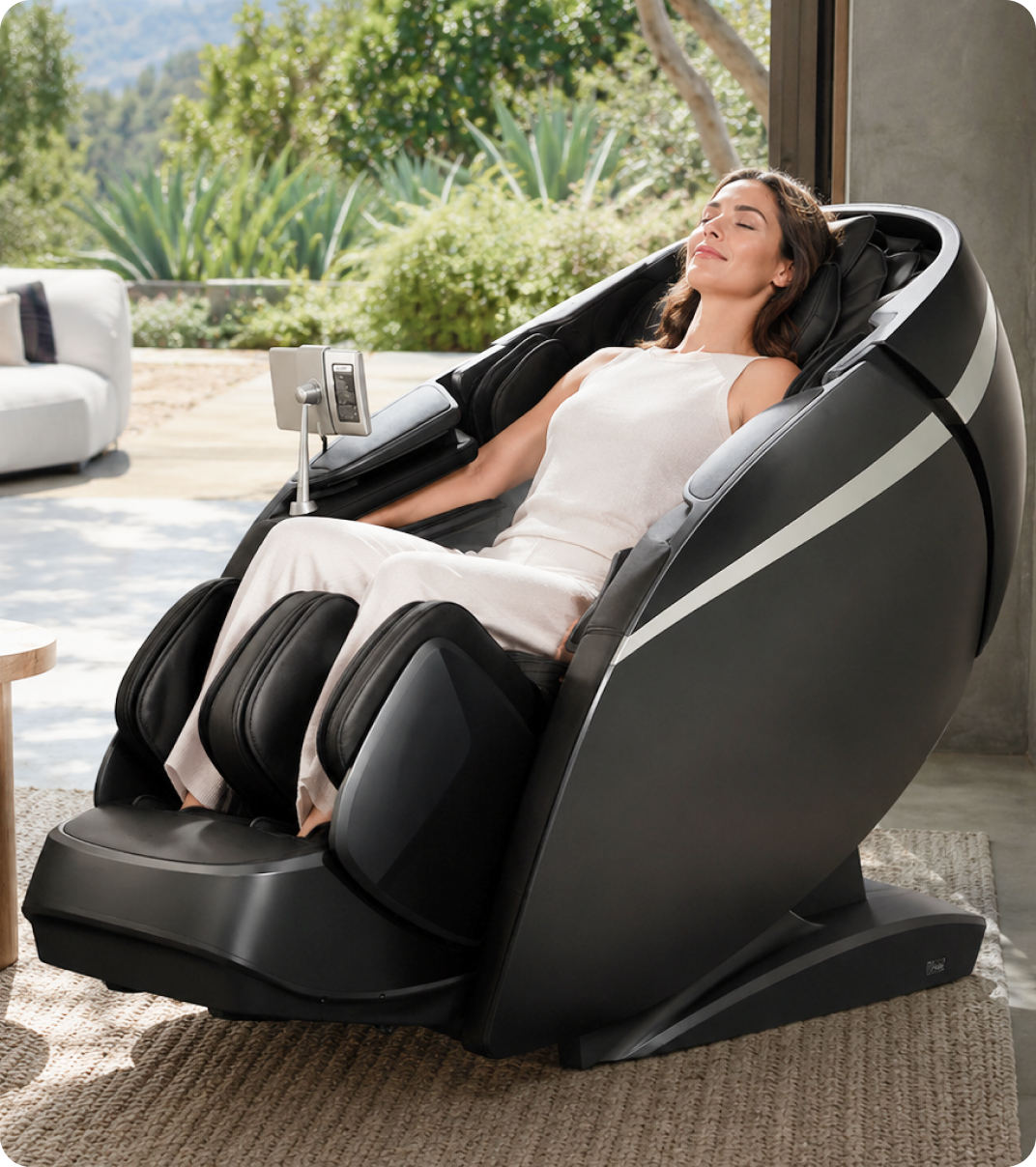 Woman relaxing in a massage chair at home.