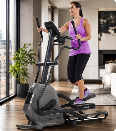 Woman working out on an elliptical at home.