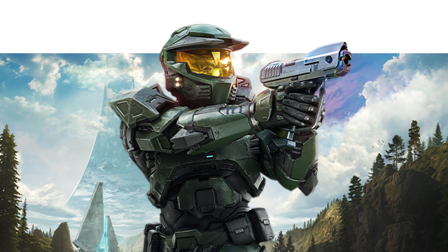 The Master Chief aims a pistol on the surface of Halo.