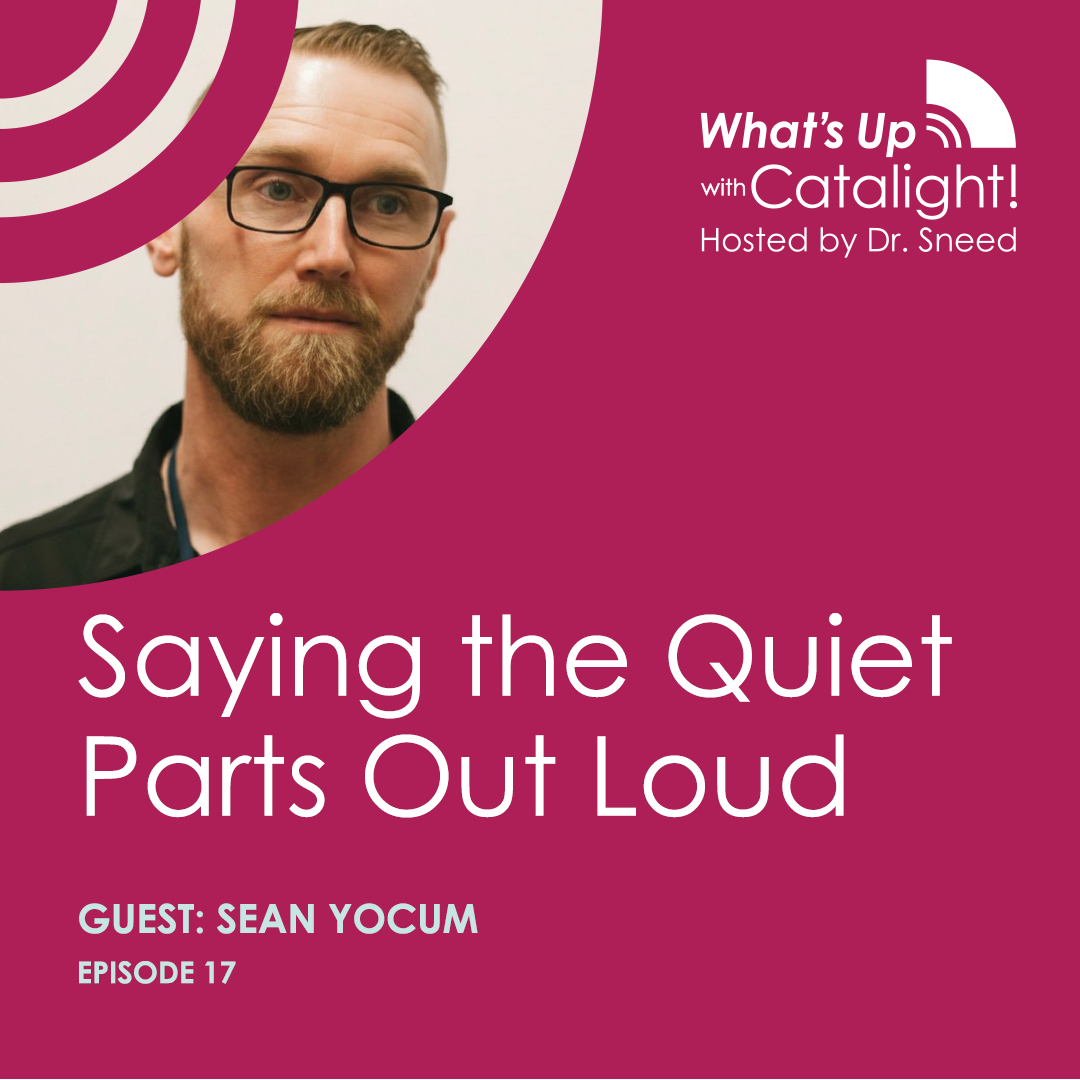 A man with glasses and a beard is featured on a podcast graphic titled “Saying the Quiet Parts Out Loud” with guest Sean Yocum, episode 17 of 