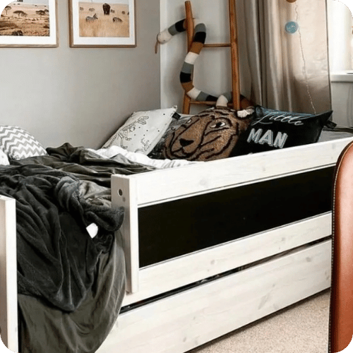 a black, white, and brown boys' room that grows with them