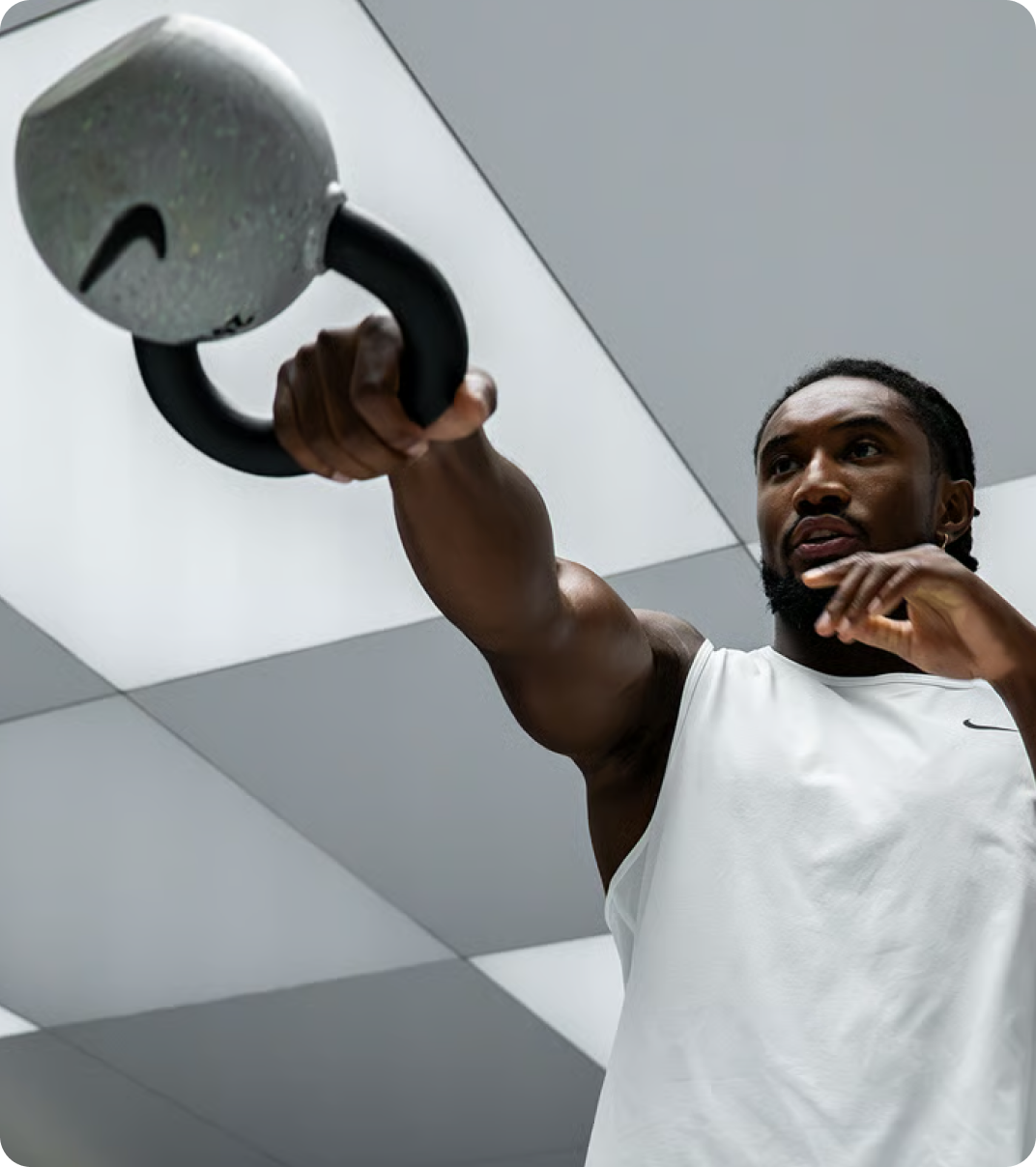 Man training with a Nike kettlebell.