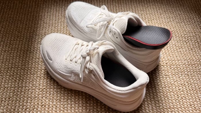 Stride insoles in a pair of white sneakers