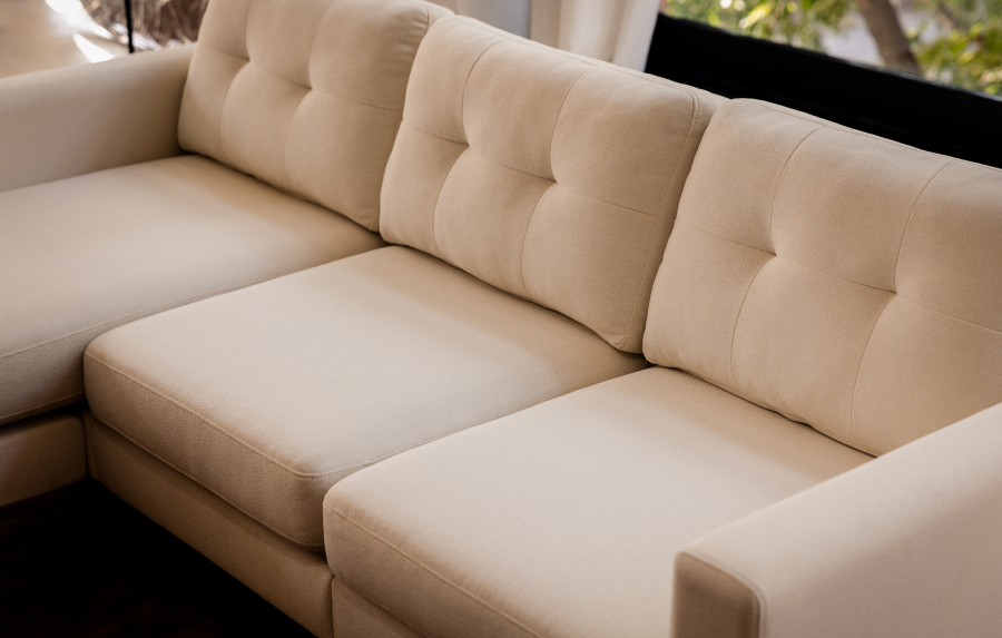 Cream tufted modular sectional